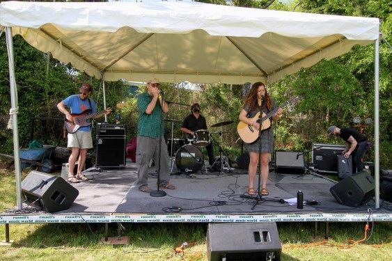 Musicians on an outdoor stage at a past HRAI event