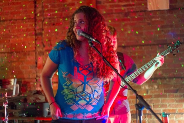 A guitarist performing at a past HRAI live music event